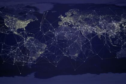 TUP transfrontalière : carte du monde de nuit reliée par un réseau de flux, image d'un patrimoine transféré à l'étranger